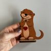 Szerelmes vidra páros – fa dekor figura
